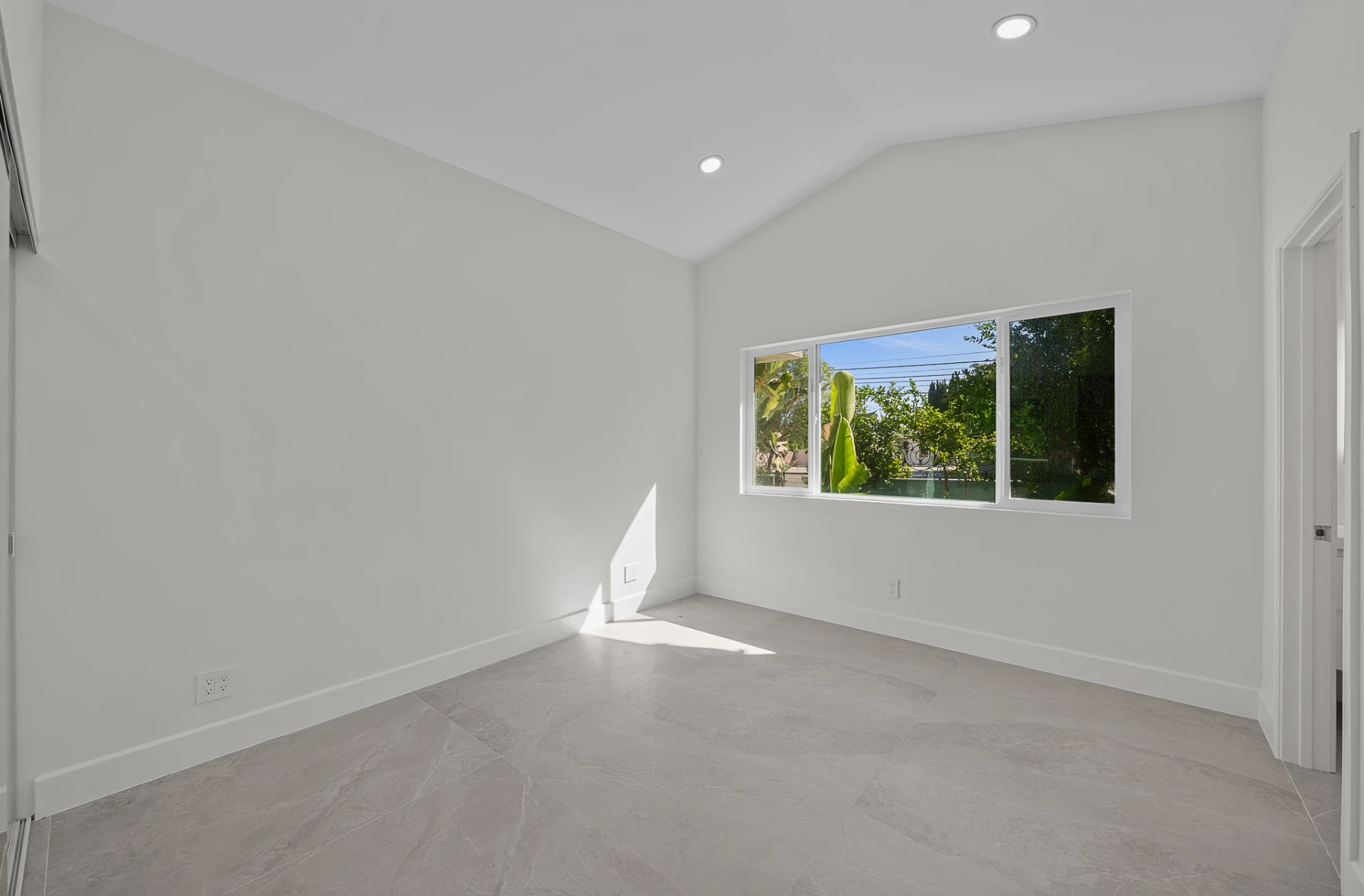 Bedroom with a sloped ceiling: empty → furnished — BEFORE