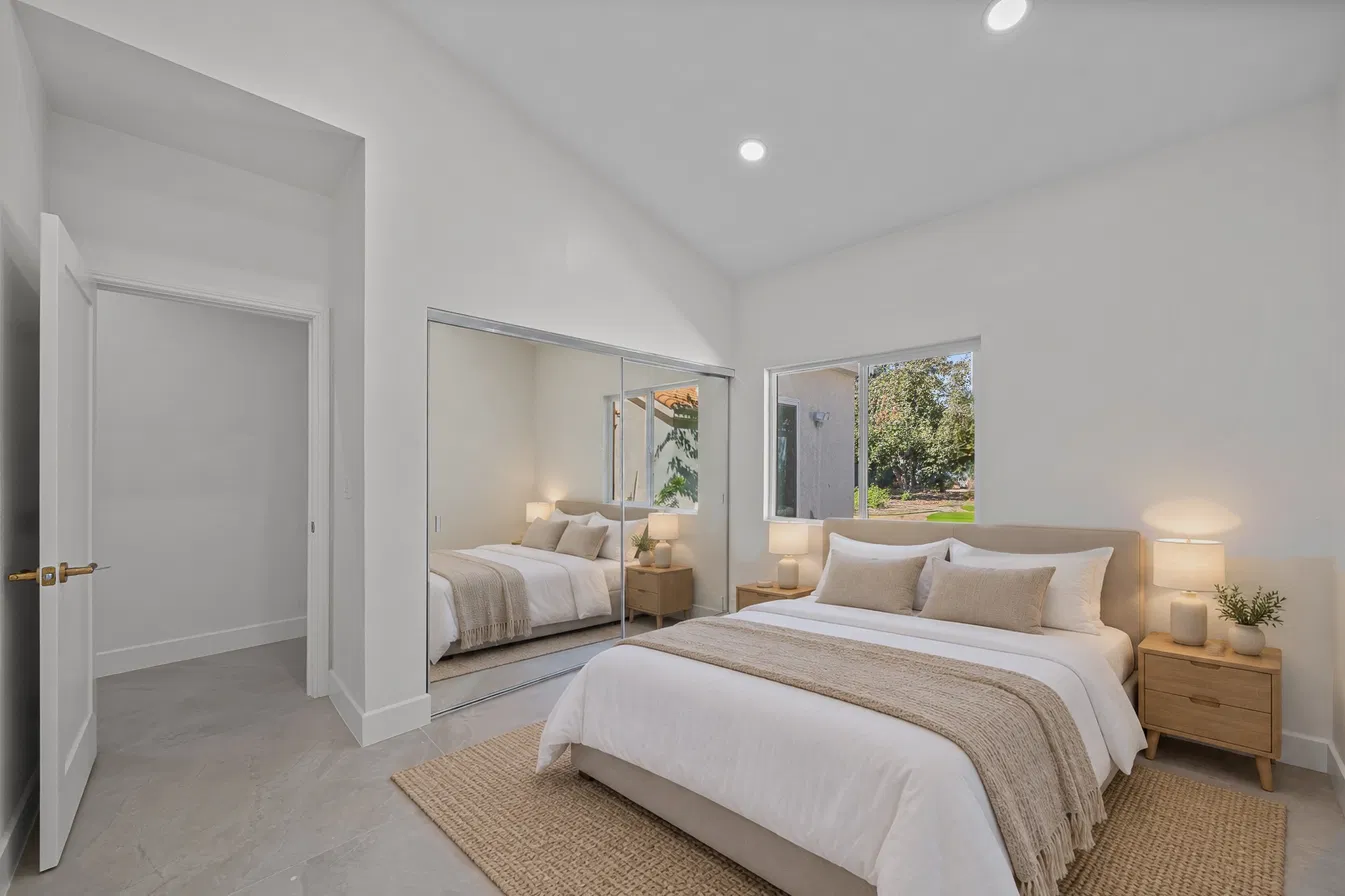 Bedroom with mirrored wardrobe, view to the window: empty → furnished