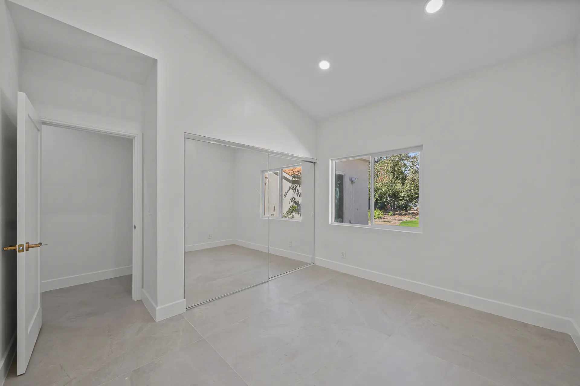 Bedroom with mirrored wardrobe, view to the window: empty → furnished — BEFORE